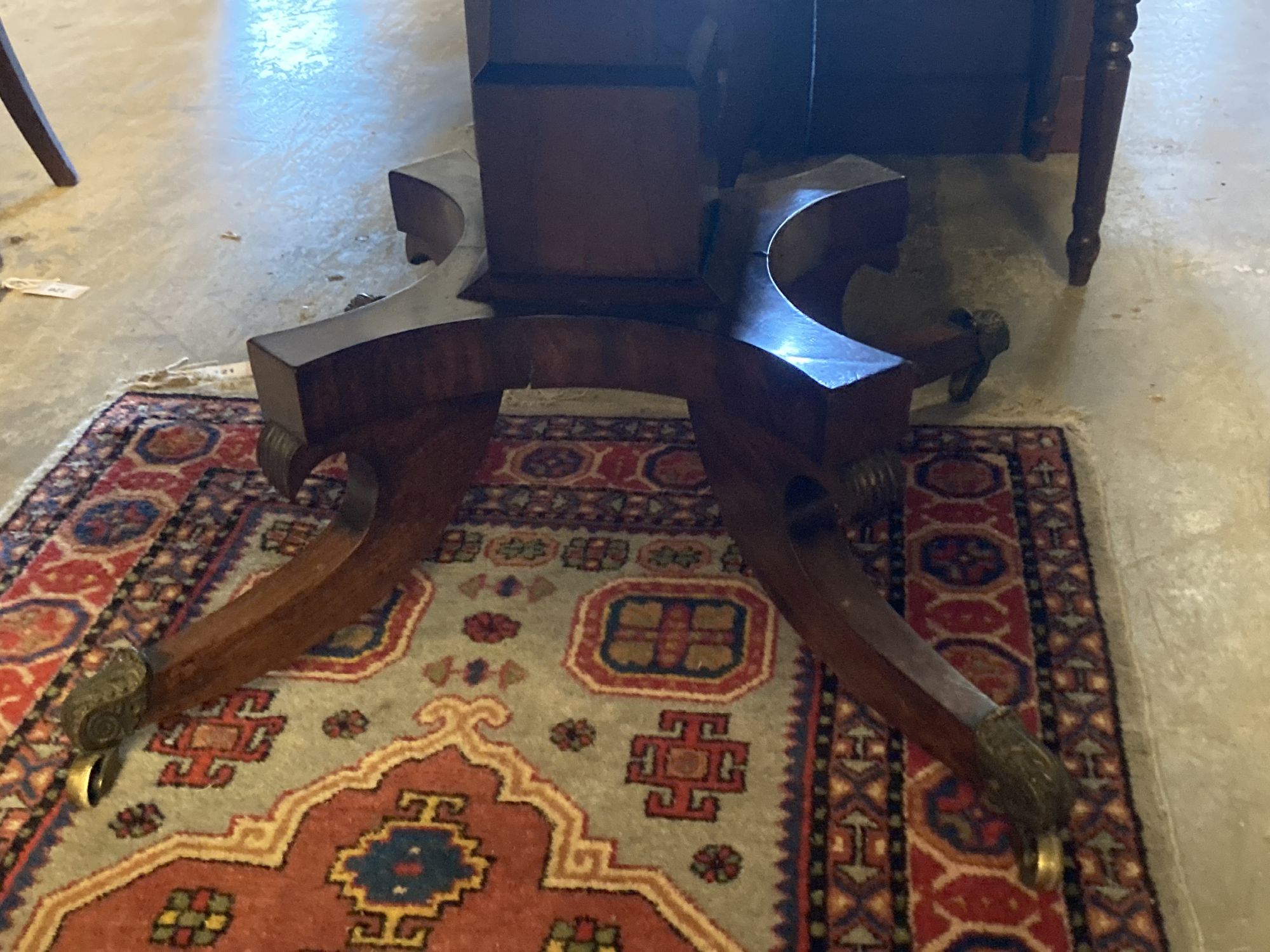 A Regency rosewood centre table fitted drawers on pillar and quadripartite platform base, width 117cm, depth 88cm, height 72cm